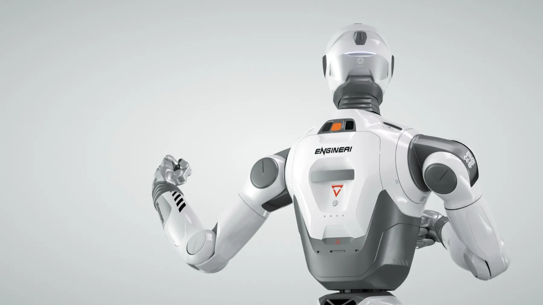 Costas do EngineAI T800, com o logotipo ENGINEAI e um dos braços erguido, de punho fechado